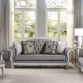 Canapé en tissu gris et revêtement en cuir finition blanc antique