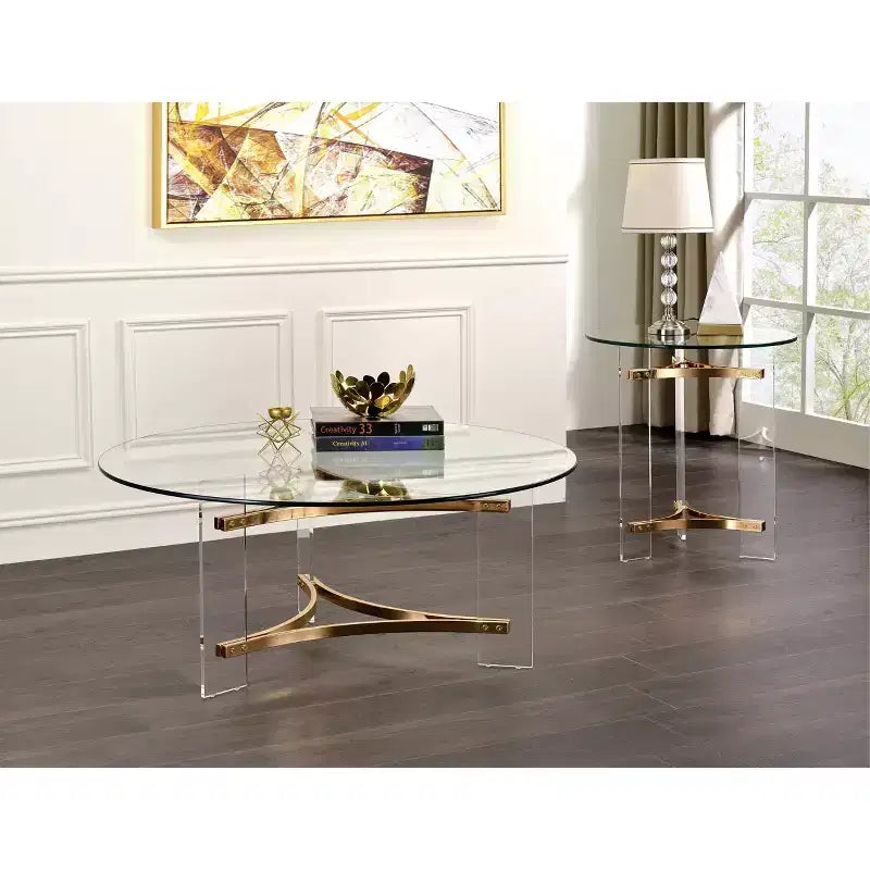 Table basse finition or ronde moderne dessus en verre trempé